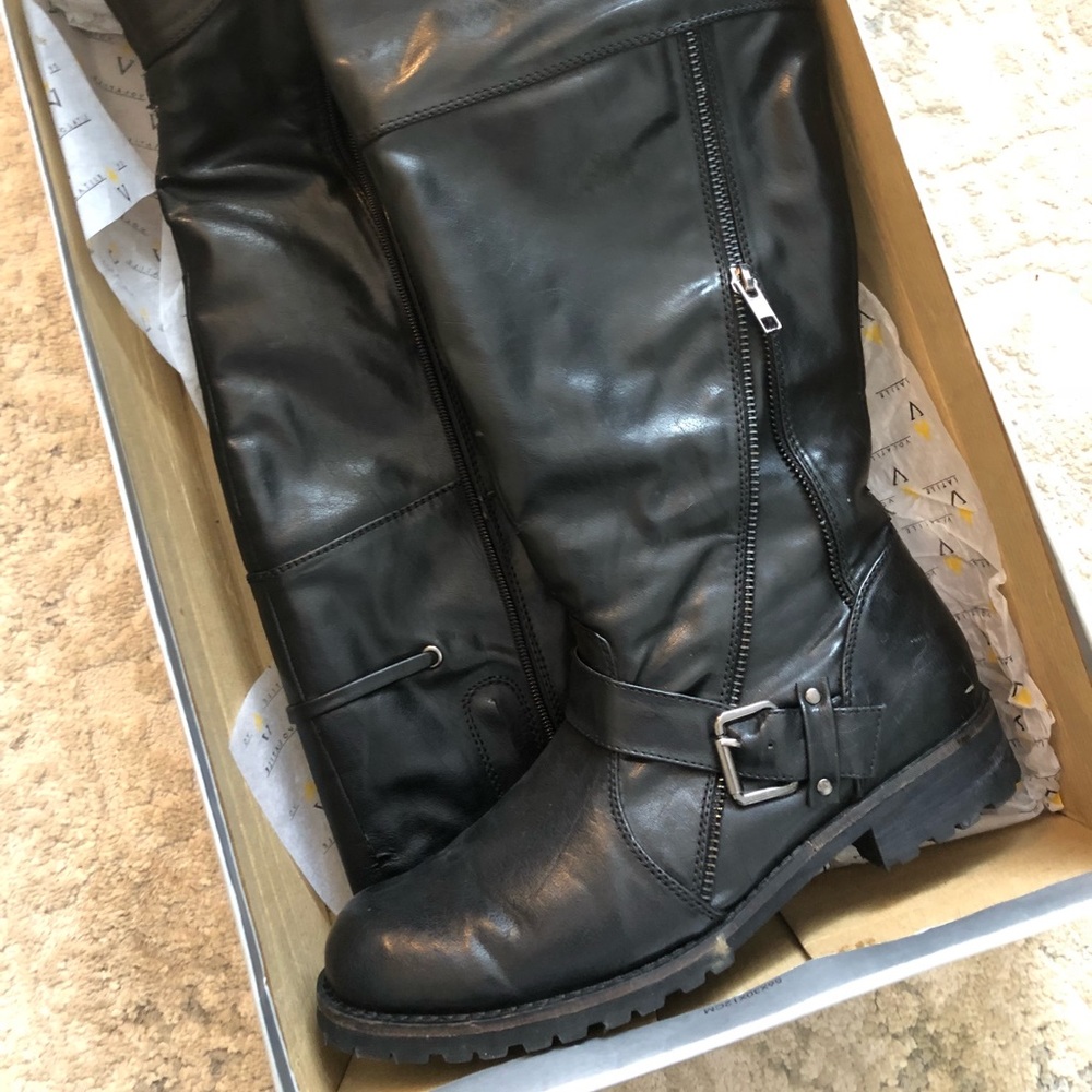 Tall black boots